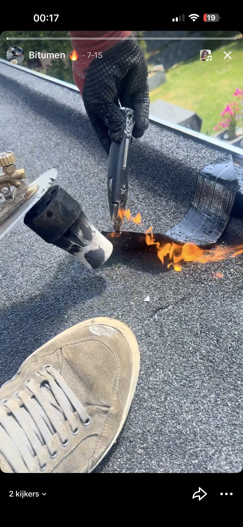 Bitumen branden met gasbrander